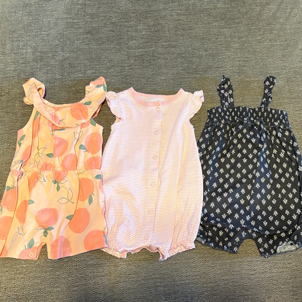 Set of 3–Carter's Peach, Pink, and Black One Piece Rompers 6-9 months